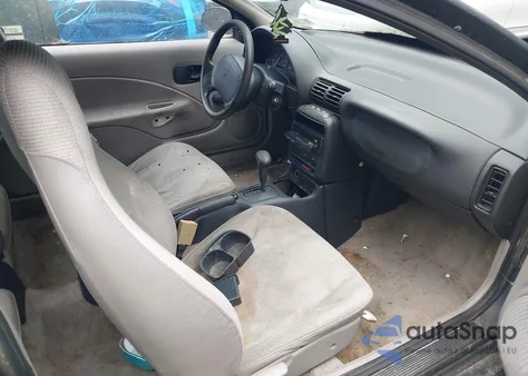 1999 Saturn Sc1 z USA, uszkodzony, nr VIN 1G8ZP1284XZ348752